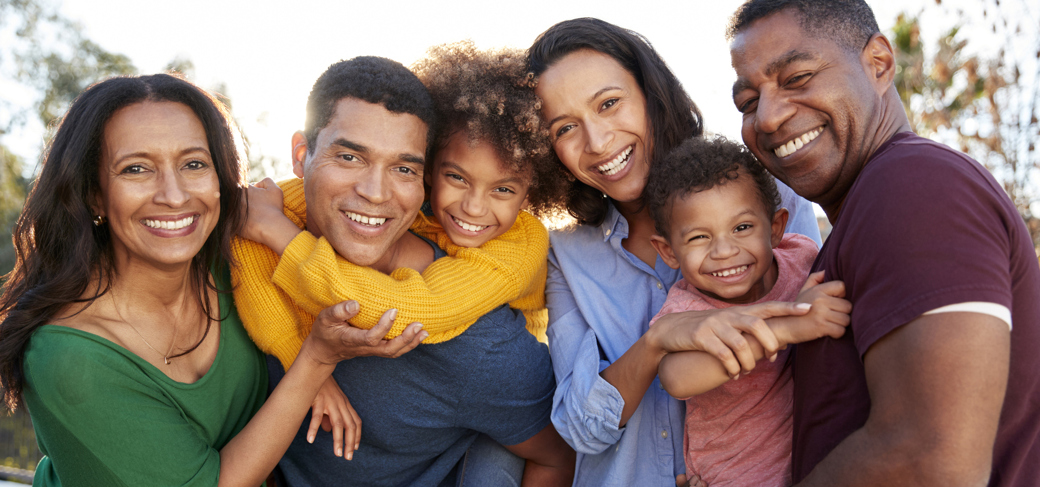 A group of people smiling.